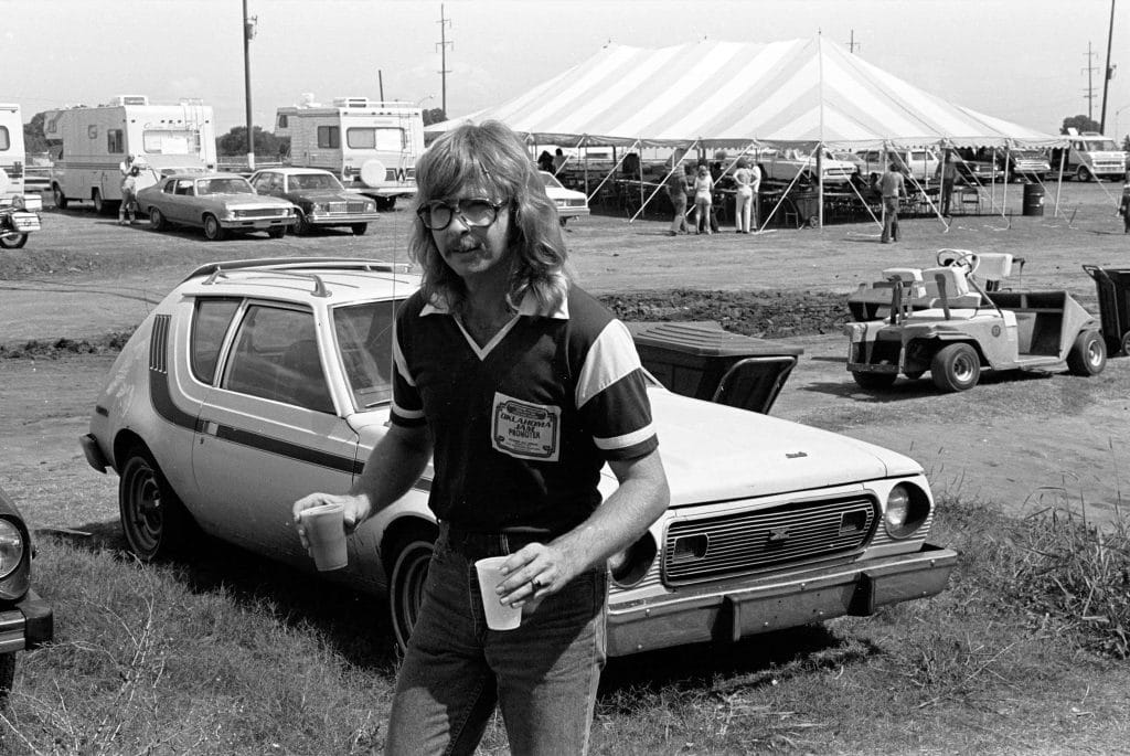 Larry Shaeffer holding beer at Okla Jam