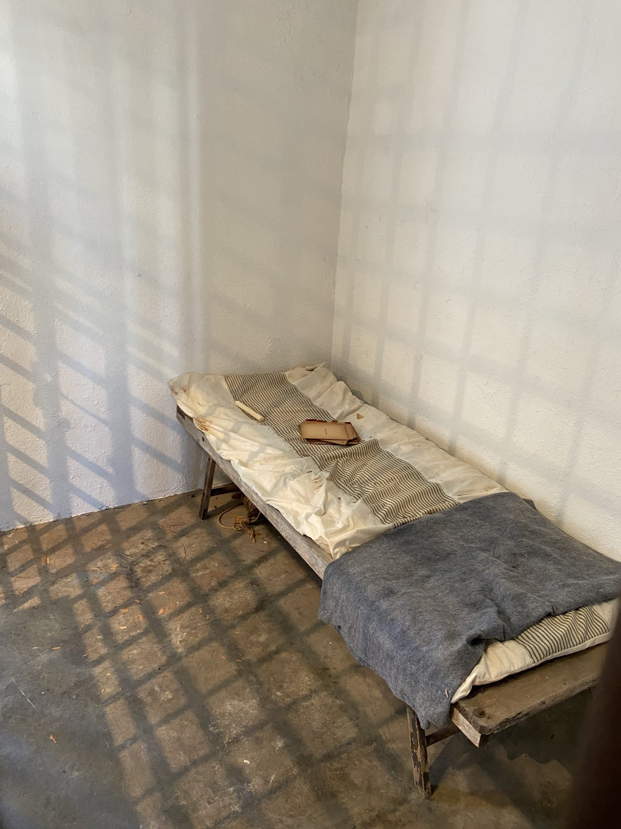 Cot in a prison cell