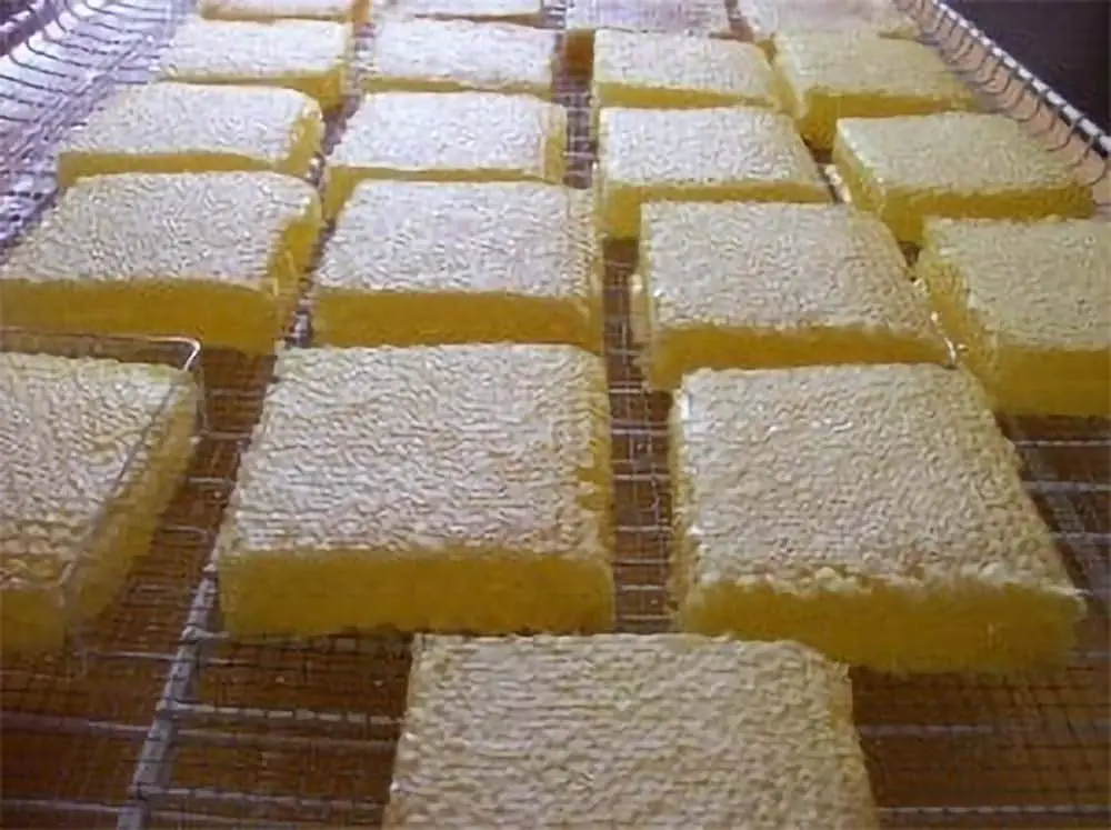 a line of honeycomb awaits packing in Africa