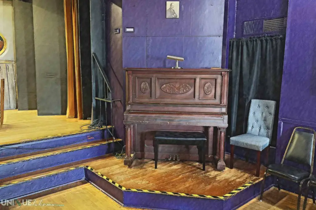 Upright piano near the stage